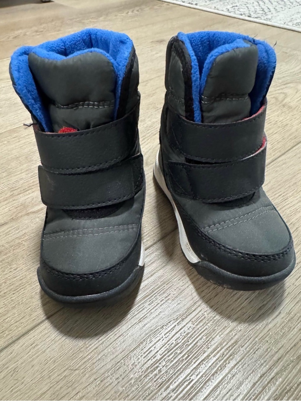 Sorel Kids Black Winter Boots with Blue Fleece Lining
